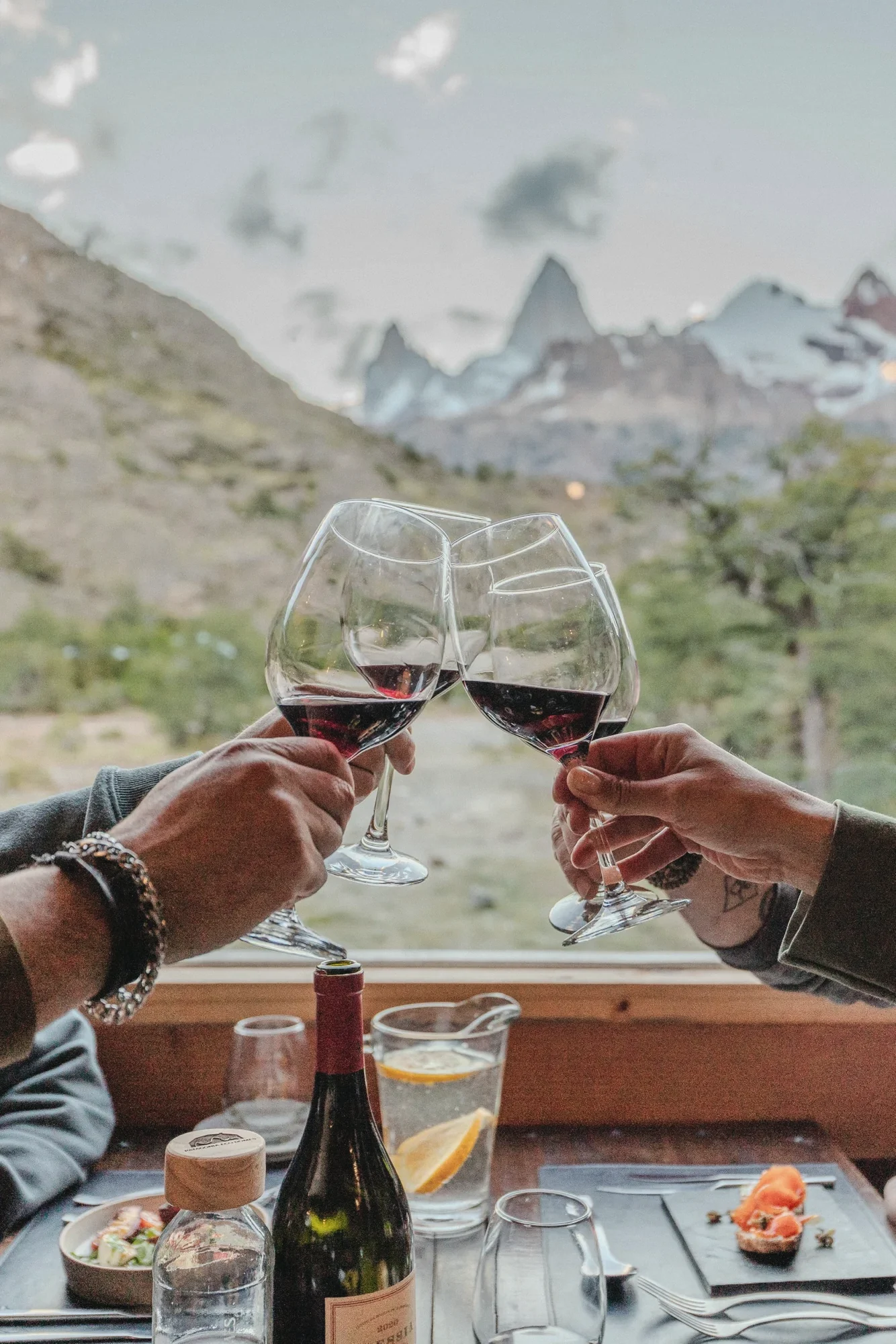 Two glasses of red wine facing Fitz Roy